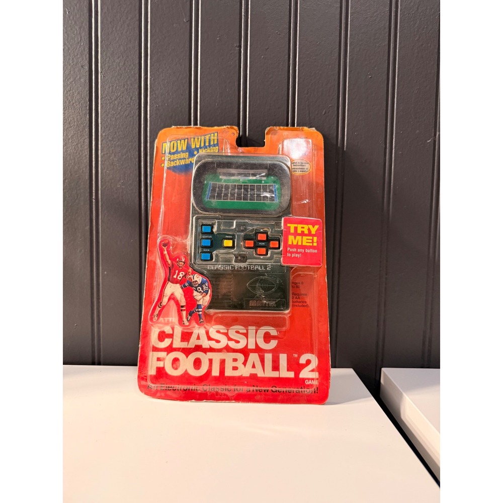 Vintage 2002 Mattel Classic
Football 2 Handheld Electronic
Video Game - New